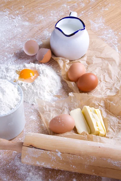 The Process Baking Cake In Kitchen - Dough Recipe Ingredients Eggs, Flour,  Milk, Butter, Sugar On Table From Above. Bake Sweet Cake Dessert Concept.  Top View. Stock Photo, Picture and Royalty Free
