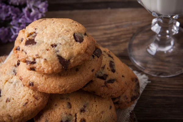 Stack of cookies with glass of milk — Stock Photo, Image