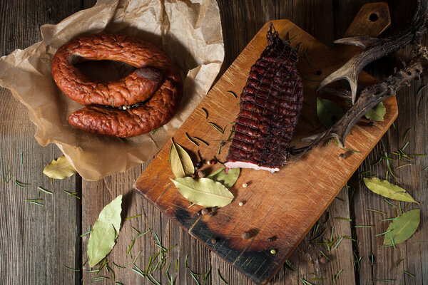 Smoked ham on a chopping board.