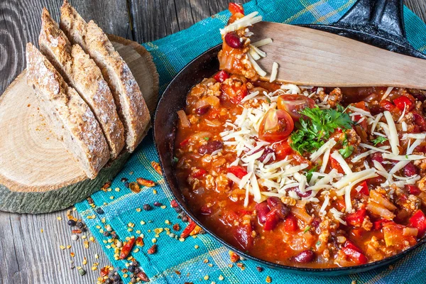 Chilli con carne with cheese. — Stock Photo, Image