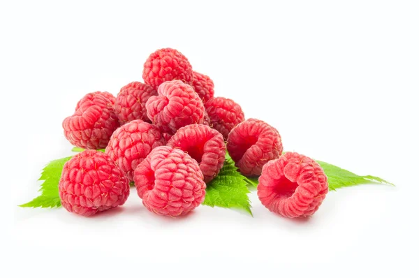 Ripe raspberry with green leaf on white background — Stock Photo, Image