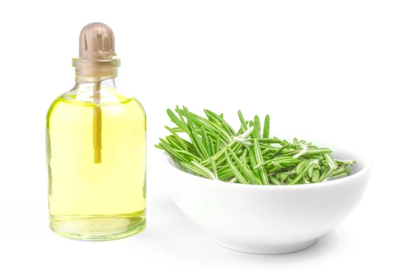 Oil in a bottle and fresh organic rosemary isolated on white — Stock Photo, Image