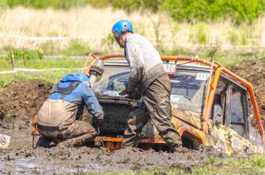 SALOVKA, RUSSIA - MAY 5, 2017: Championship of off-road cars in the marshes at the annual car racing 