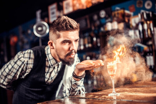 Barman concocts a cocktail on the beerhouse