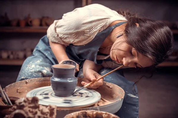 Charming craftsmen making ceramic pot on the pottery wheel . Making ceramic dishes. — Stock Photo, Image