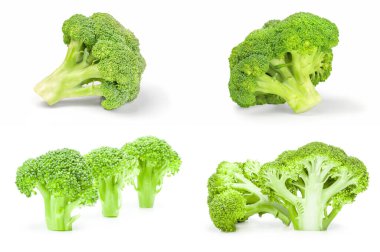 Beyaz arka planda bir grup taze yeşil brokoli.