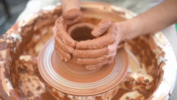 Ceramist working with pottery at the ceramic workshop. Handmade products. Close-up. — Stock Video