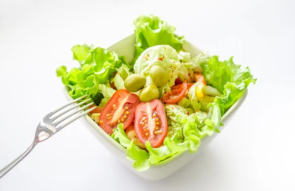 Salad with vegetables and greens on white background — Stock Photo, Image