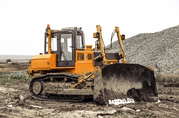 The yellow working grader — Stock Photo, Image