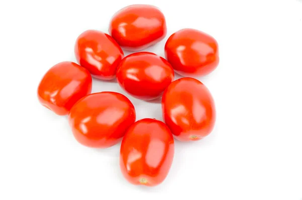 Een paar tomaten geïsoleerd op witte achtergrond — Stockfoto