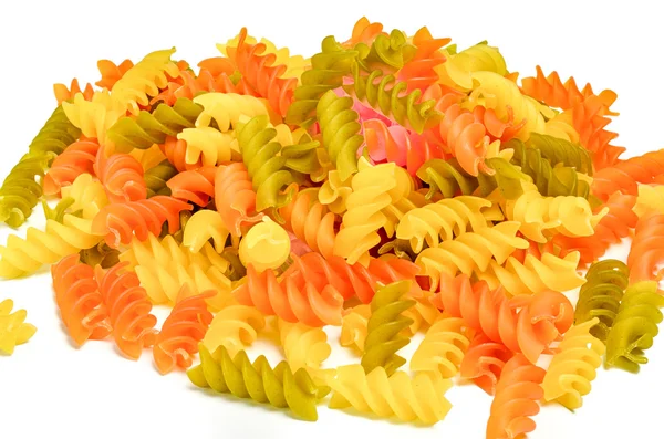 Colorata pasta fusilli secca tri colorata isolata su bianco — Foto Stock