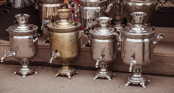 Old samovars in row — Stock Photo, Image