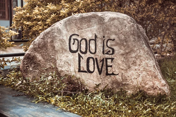 Stone "God is love" in Sri Lanka — Stock Photo, Image