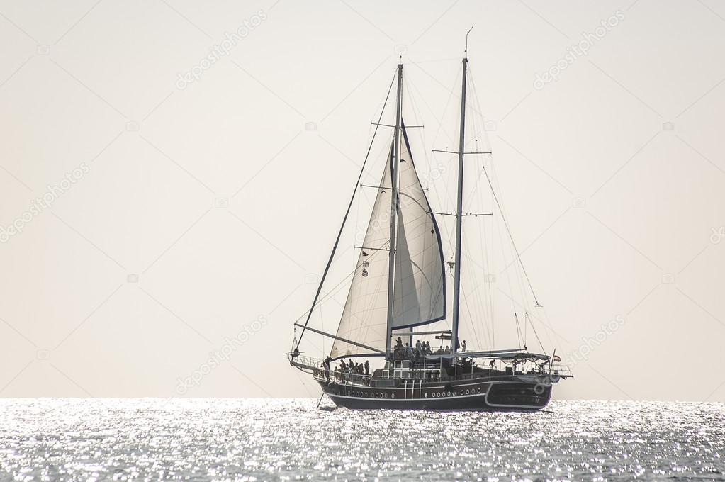  Unidentified sailboat participate in sailing regatta 