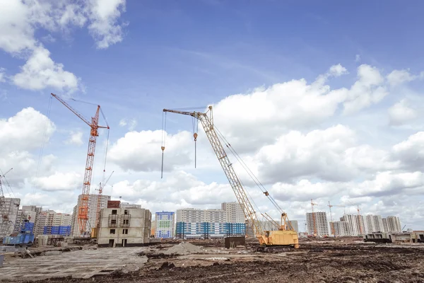 Industrial landscape and column crane — Stock Photo, Image