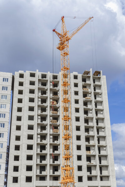 Multi-storey housing and big cranes