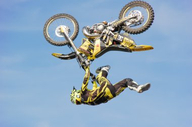 PENZA, RUSSIA - JUNE 18, 2011: Freestyle motox rider. Motorshow Night Of The Jumps clipart