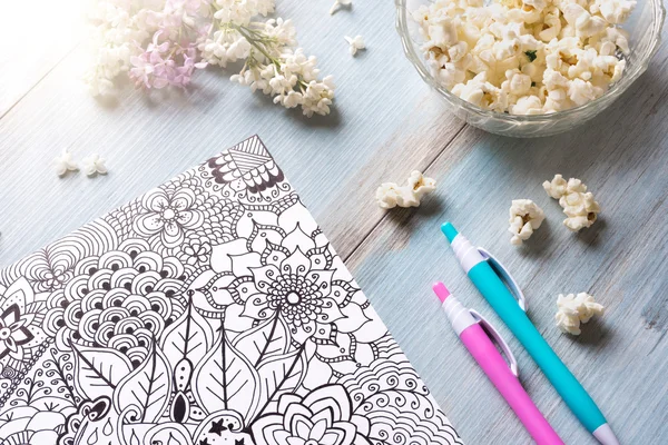 Adult coloring books, new stress relieving trend — Stock Photo, Image