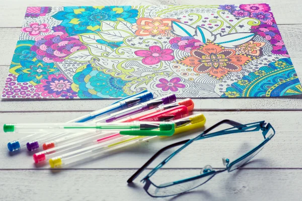 Adult coloring books, new stress relieving trend — Stock Photo, Image