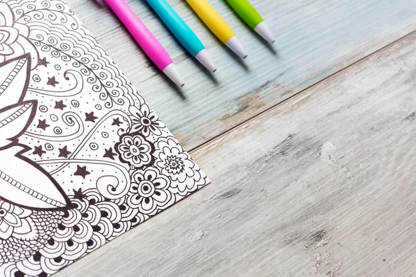 Adult coloring books, new stress relieving trend — Stock Photo, Image
