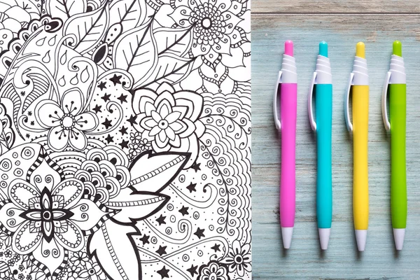 Adult coloring books, new stress relieving trend — Stock Photo, Image