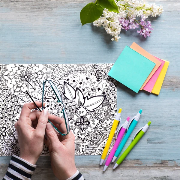 Flat lay, female coloring adult coloring books, new stress relieving trend — Stock Photo, Image