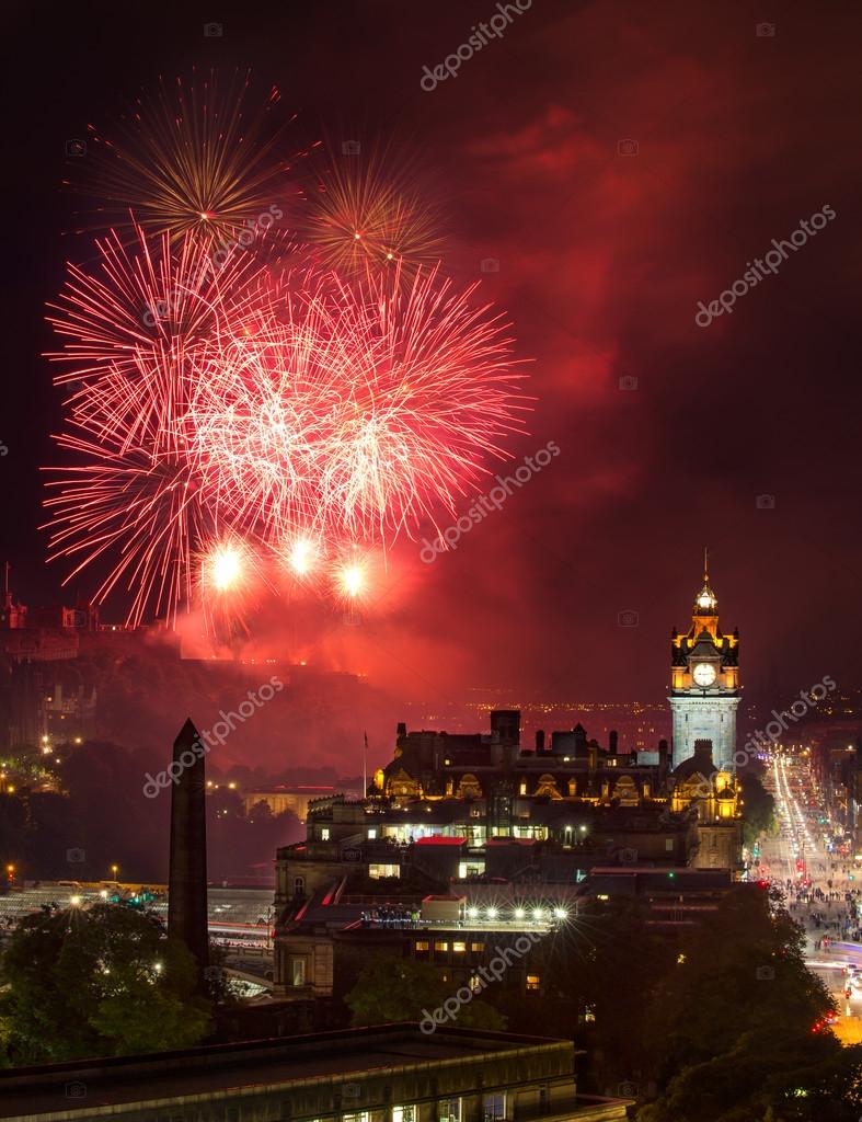 Edinburgh Cityscape with fireworks over The Castle and Balmoral Clock