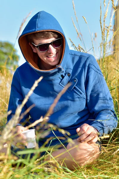 Young man outdoors portrait with copy space — Stock Photo, Image