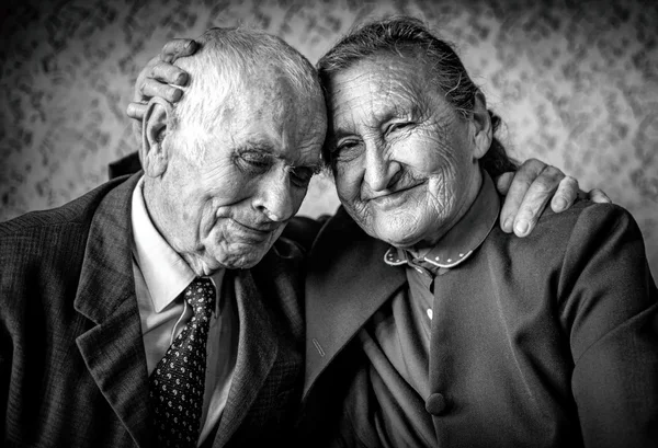 A loving, handsome senior couple. Romantic Senior Couple Hugging. Loving each other forever. Happy retirement concept. — Stock Photo, Image