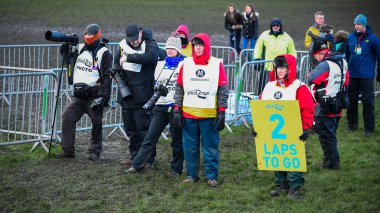 EDINBURGH, SCOTLAND, UK, January 10, 2015 - various press photographers at the Great Edinburgh Cross Country Run. This Men's Invitational 4k race was won by last year's champion Garrett Heath of USA. clipart