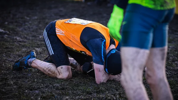 EDINBURGH, SCOTLAND, UK, January 10, 2015 - elite athletes exhausted after the Great Edinburgh Cross Country Run. Men's Invitational 4k race was won by last year's champion Garrett Heath, USA. — Stock Photo, Image