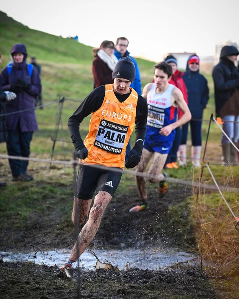 Edinburgh, Schotland, Uk, 10 januari 2015 - elite atleten concurreren in de grote Edinburgh Cross land uitvoeren. Deze mannen 8 k race werd gewonnen door vorig jaar kampioen Chris Derrick. — Stockfoto