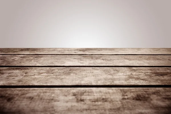 Grungy wooden deck table on white background — Stock Photo, Image