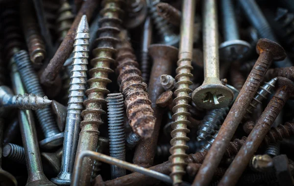 Old rusty metal screws detail shot — Stock Photo, Image