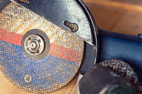 Old used big powerful angle grinder with abrasive disk — Stock Photo, Image