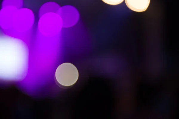 Abstract van paarse concert lights bokeh achtergrond — Stockfoto