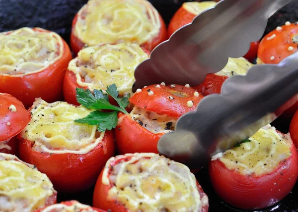 Tomates assados recheados com arroz e carne Fotografia De Stock