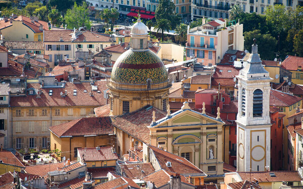 Aerial view of "Sainte-Reparate" catholic cathedral and old city roof tops in Nice, France