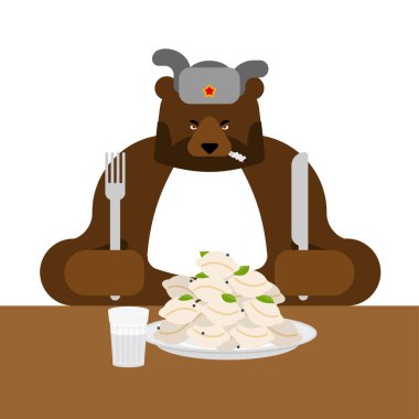 Rusya 'da öğle yemeği. Kızgın Rus Ayısı hamur köftesi yer. Geleneksel Rus yemekleri