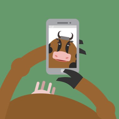 Selfie cow. Animal is photographed on  phone. Smartphone in  hoo clipart