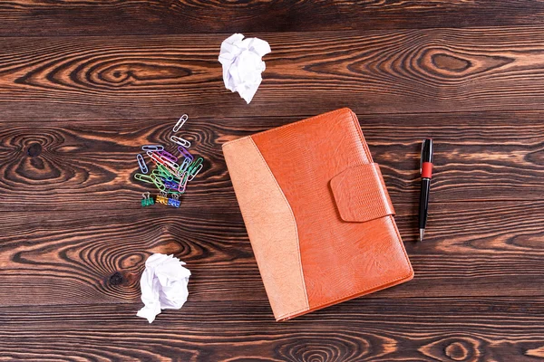 Closed notebook on the table — Stock Photo, Image