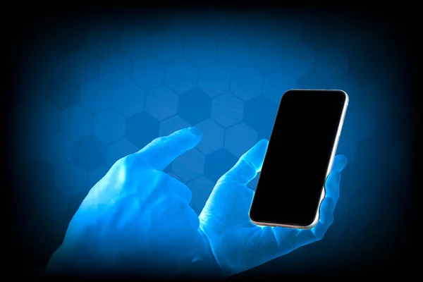 A man\'s blue hand holds a mobile phone with his left hand, pointing with right hand ,a black screen,hitech Background