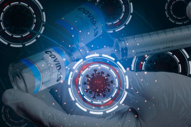 Kalkandaki koronavirüsün sembolü arka plan covid-19 aşısı için bir hazırlık. Konsept şu: Enfeksiyonun şiddetini azaltacak bir aşımız var..