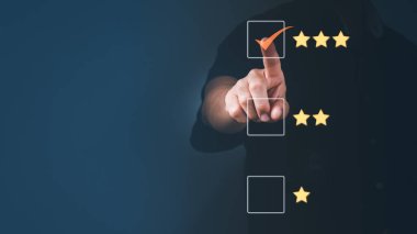 The man touching the virtual screen on the gap with a 3-star symbol to give satisfaction in service. rating very impressed,Customer service and Satisfaction concept clipart