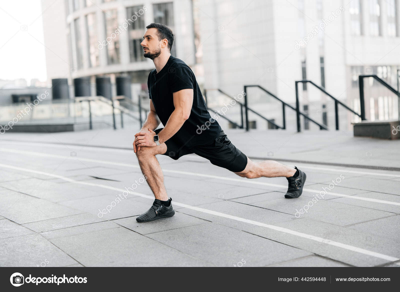Strong man doing lunge Side Sport in big city