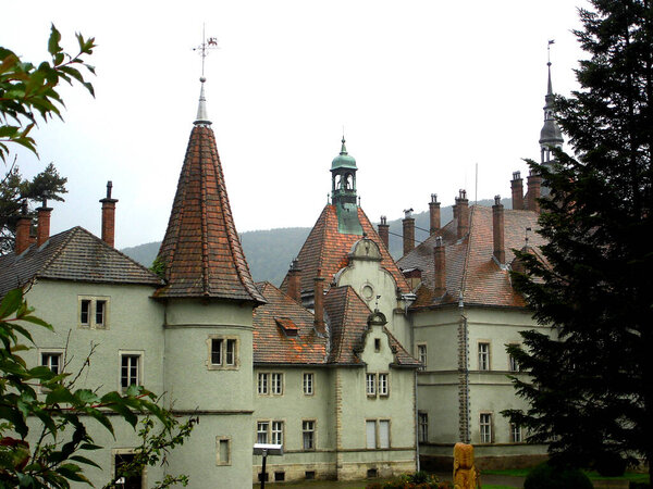 Wet red tiled roof with turrets at Shenborn Palace