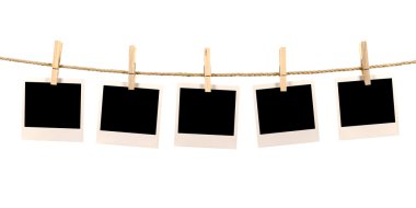 Several blank polaroid style instant photo print frames hanging  clipart