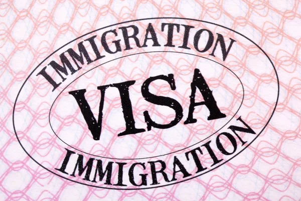 Immigration visa stamp passport page close up — Stock Photo, Image