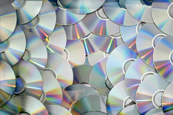 DVD CD disc pile technology background texture pattern — Stock Photo, Image