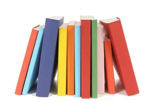 Row of colorful paperback books — Stock Photo, Image